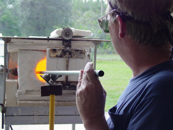 Reheating glass gather for furnace beads
