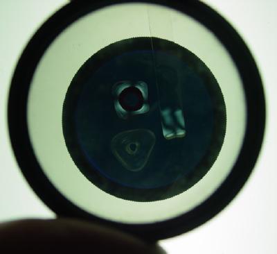 beads and strip on bottom lens